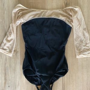 Elevé leotard with illusion flesh colored mesh top. Small snagging in the mesh